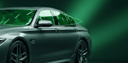 Car dent visible under Paint Protection Film after strong impact