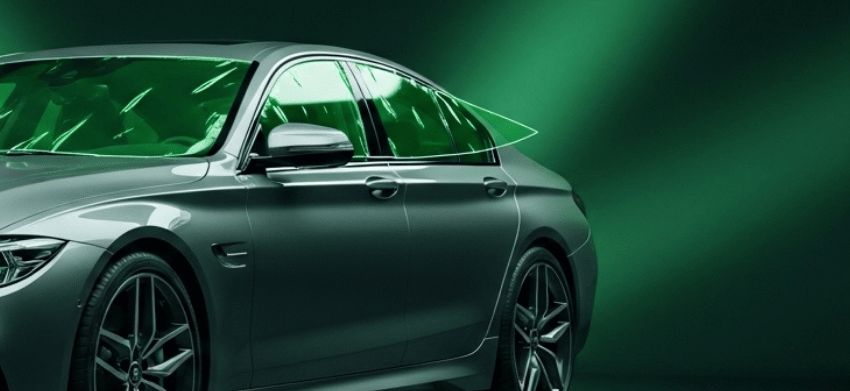 Car dent visible under Paint Protection Film after strong impact